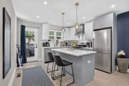 Elegant 4BR · Roof Deck & Movie Rm · 8 Min to CHOP - Image 3