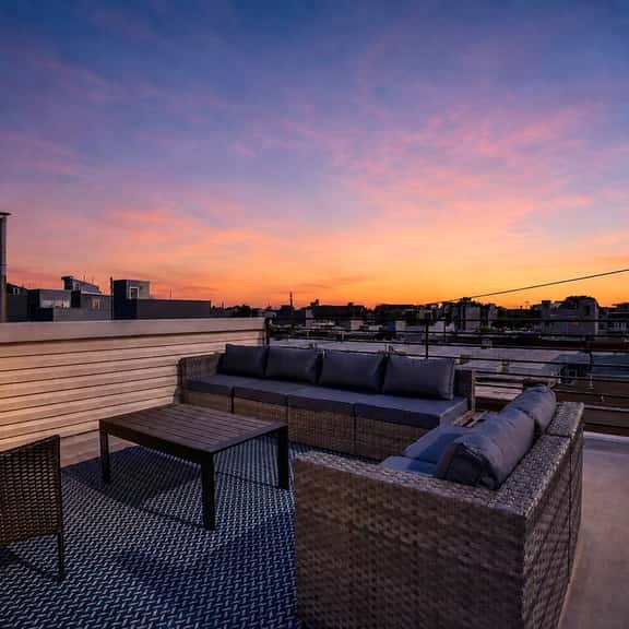 Elegant 4BR · Roof Deck & Movie Rm · 8 Min to CHOP - Image 1