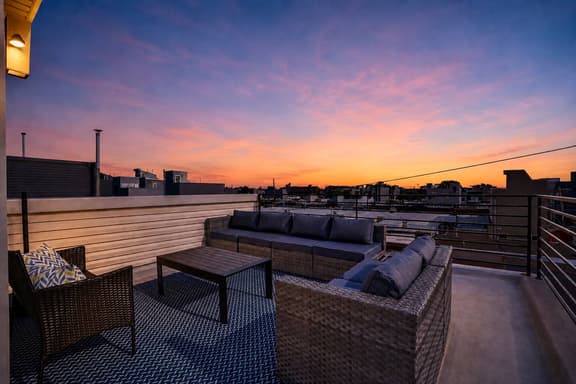 Elegant 4BR · Roof Deck & Movie Rm · 8 Min to CHOP - Image 1